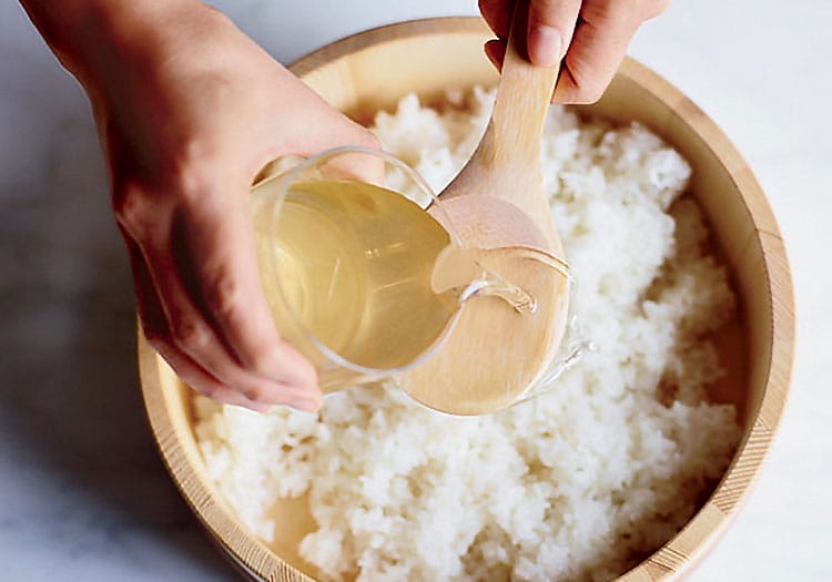 Sushi Rice Recipe - Adding rice vinegar for flavor